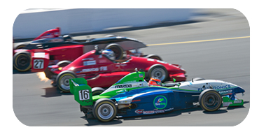 3 wide through turn 1 at Infineon Raceway at the Indy GP of Sonoma